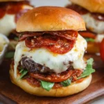 A juicy {{ $('Fetch Recipe Data').first().json["Main Keyword"] }} with melted mozzarella, pepperoni, greens, and marinara on a toasted bun.